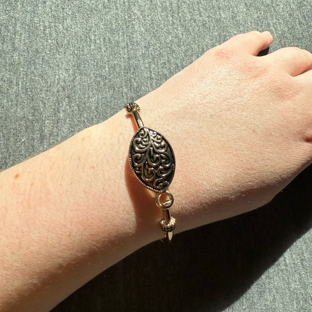 Intricate Gold Bracelet with Design